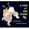 A Pair of Red Clogs