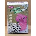 Mini battery op sewing machine.