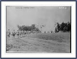 Photo (L): 336th Inf. Charging enemy