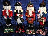 MILITARY OLD WORLD HISTORIC SANTA CLAUS SET / PERIOD CEREMONIAL DRESS UNIFORM 4 PIECE CERAMIC CHRISTMAS HOLIDAY YULE DECOR ACCENT NUTCRACKER & PERIOD STYLE FIGURINE CURIO SET