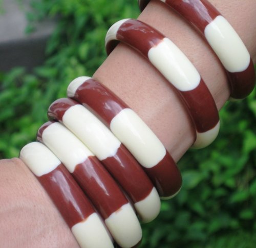 Click here to buy 2 Ivory and Burnt Umber Lucite Bangles.