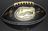 Urban Meyer Autographed Florida Gators Black Leather Football with 06 NAT CHAMPS inscription