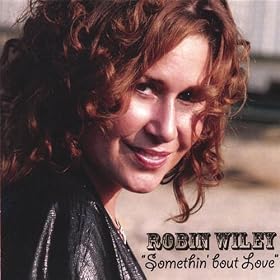 Somethin' Bout Love Featuring Woody Guthrie's First Time Released Hot Rod Money & His Deportee. Produced By 2 Time Grammy