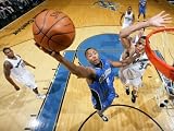 Orlando Magic v Washington Wizards: Rashard Lewis and JaVale McGee Photographic Poster Print by Ned Dishman, 30x40