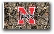 NCAA Nebraska Cornhuskers 3-by-5 Foot Flag with Grommets - Realtree Camo Background