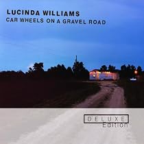 Car Wheels On A Gravel Road