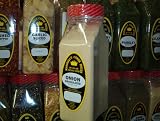 ONION GRANULATE FRESHLY PACKED IN LARGE JARS, spices, herbs, seasonings, powder