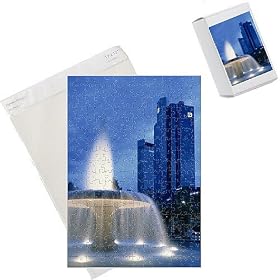 Photo Jigsaw Puzzle of The Deutsche Bank with water fountain illuminated at dusk from Robert Harding
