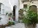 Koper Courtyard off Kidriceva Ulica, Slovenia Scenic Photographic Poster Print by Walter Bibikow, 24x18