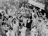 U.S. Soldiers Dancing. the Banner to the Right Reads: 