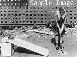 1920 Little Dorothy Messina playing miniature golf on a homemade course, Ozone Park, L.I.