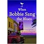 When Bobbie Sang the Blues (A Cozy Mystery, Book 2)