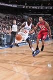 New Jersey Nets v Philadelphia 76ers: Jrue Holiday and Devin Harris Photographic Poster Print by David Dow, 8x12