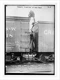 Newswire Photo (S): Tramps fighting between railroad cars