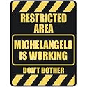 " RESTRICTED AREA MICHELANGELO IS WORKING " PARKING SIGN