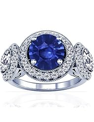 Platinum Round Cut Blue Sapphire Ring With Sidestones