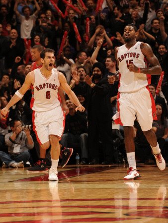 Houston Rockets v Toronto Raptors: Jose Calderon and Amir Johnson Photographic Poster Print by Ron Turenne, 30x40