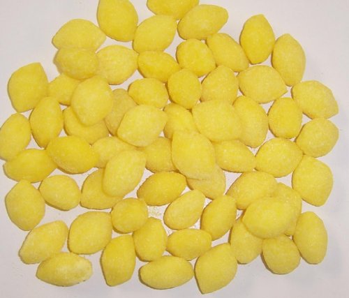 Cover image : Scott's Cakes Lemon Drops in a Blue Snowman Can