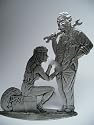 Erotik - Zinnfigur / Flachfigur "Die Reifenpanne" 28-15O