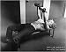 Marilyn Lifting Weights by Philippe Halsman - Fine Art Print / Poster - 28.00 x 22.00
