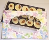 Scott's Cakes 1 lb. White Chocolate Almond Clusters in a Daisy Box