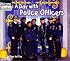 A Day With Police Officers (Welcome Books)