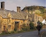 IMAGE OF Photographic Prints of Horse and rider passing honey coloured stone cottages in the village of from Robert Harding