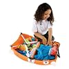 Girl Packing Trunki Suitcase