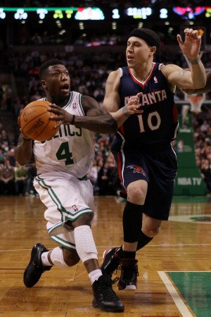 Atlanta Hawks v Boston Celtics: Nate Robinson and Mike Bibby Photographic Poster Print by Elsa , 12x18