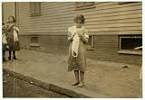 Photo A typical view of Carmina Caruso, a ten year old Home Worker as she walks around crocheting as she goes. See also