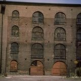 Facade of Rundown Shuttered Swift and Co. Warehouse Photographic Poster Print, 24x24