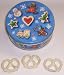 Scott's Cakes 1 lb. White Chocolate Covered Pretzel in a Christmas Cookie Tin