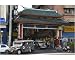 10x8 Photograph (25x20cm) Jeepney driving under Chinatown Gate by Robert Harding