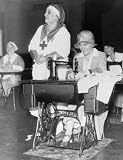 1932 photo Mrs. Herbert Hoover at sewing machine with Mrs. J.H. Fishback of the Red Cross at Red Cro