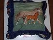Realistic Horses 16" Zippered Throw Pillows features horses running through the field