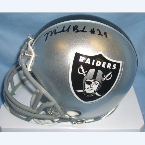 Michael Bush (Oakland Raiders) Signed Autographed Mini Helmet (PSA/DNA COA)