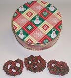 Scott's Cakes 1 lb. White Chocolate Covered Pretzel with Christmas Jimmies & Chocolate Chips in a Snowman Tin