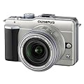Olympus PEN E-PL1 Systemkamera (13 Megapixel, 6,9 cm (2,7 Zoll) Display, Bildstabilisator) champagner mit 14-42mm Objektiv silber