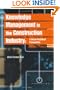 Knowledge Management in the Construction Industry: A Socio-Technical Perspective