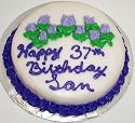 Chocolate Decorated Cake Single Layer 8" Round Purple Trim and Lavender Flowers