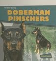 Doberman Pinschers (Fiedler, Julie. Tough Dogs.)