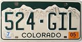 Colorado License Plate with Green Letters on White Mountain