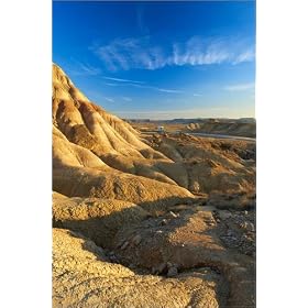 photographie Rock formations with campervan in background, Bardenas Reales Blanco. est disperible...