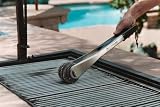 GrillScrubber , the barbecue grill scrub brush with replaceable stainless steel scouring pads.
