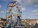 Big Ferris Wheel in Luna Park Amusements Funfair by Harbour, Scarborough, North Yorkshire, England Photographic Poster Print by Pearl Bucknall, 16x12