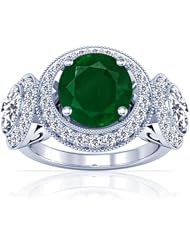 Platinum Round Cut Emerald Ring With Sidestones