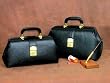 `Intern/Student Boston Bag 14 Brown Leather BOSTON LEATHER PHYSICIAN BAG * 14 x 6 x 10 Brown * Features two interior pockets and a 1-position lock * Boston bag have reinforced corners and a 3-position lock * Black Pebble or Brown Pebble