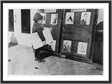 Historic Print (L): Ernest Chester, 5 years old lives at 624 S. Robinson St. Sells with his older brother Em