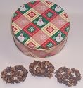 Scott's Cakes 1 lb. Dark Chocolate Covered Pretzel with Chocolate Chips & Peanut Butter Chips in a Snowman Tin