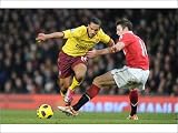 Photographic Prints of Theo Walcott (Arsenal) Michael Carrick (Man United). Manchester United 1 from Arsenal FC Prints